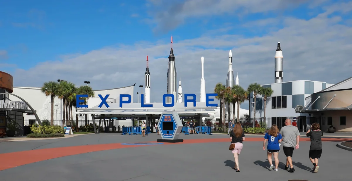 family entering to kennedy space center